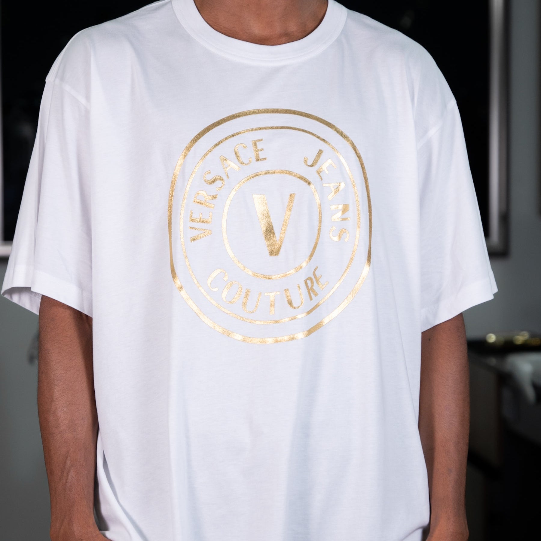 VERSACE JEANS BLANCA CIRCULO DORADO